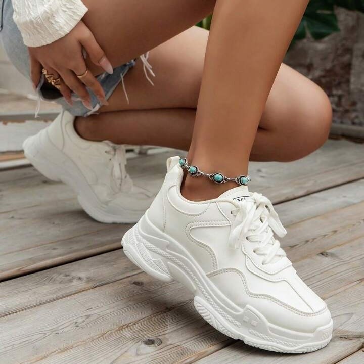 white sports shoes for women