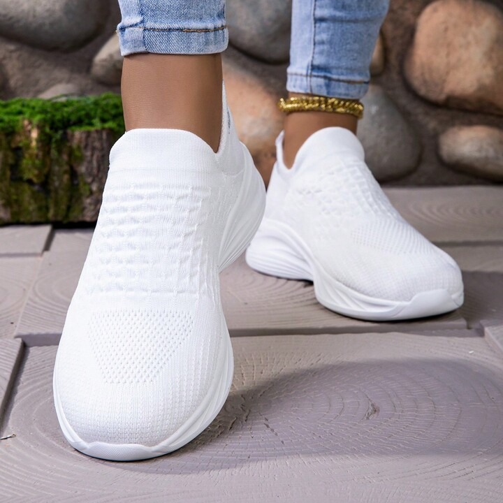 white sports shoes